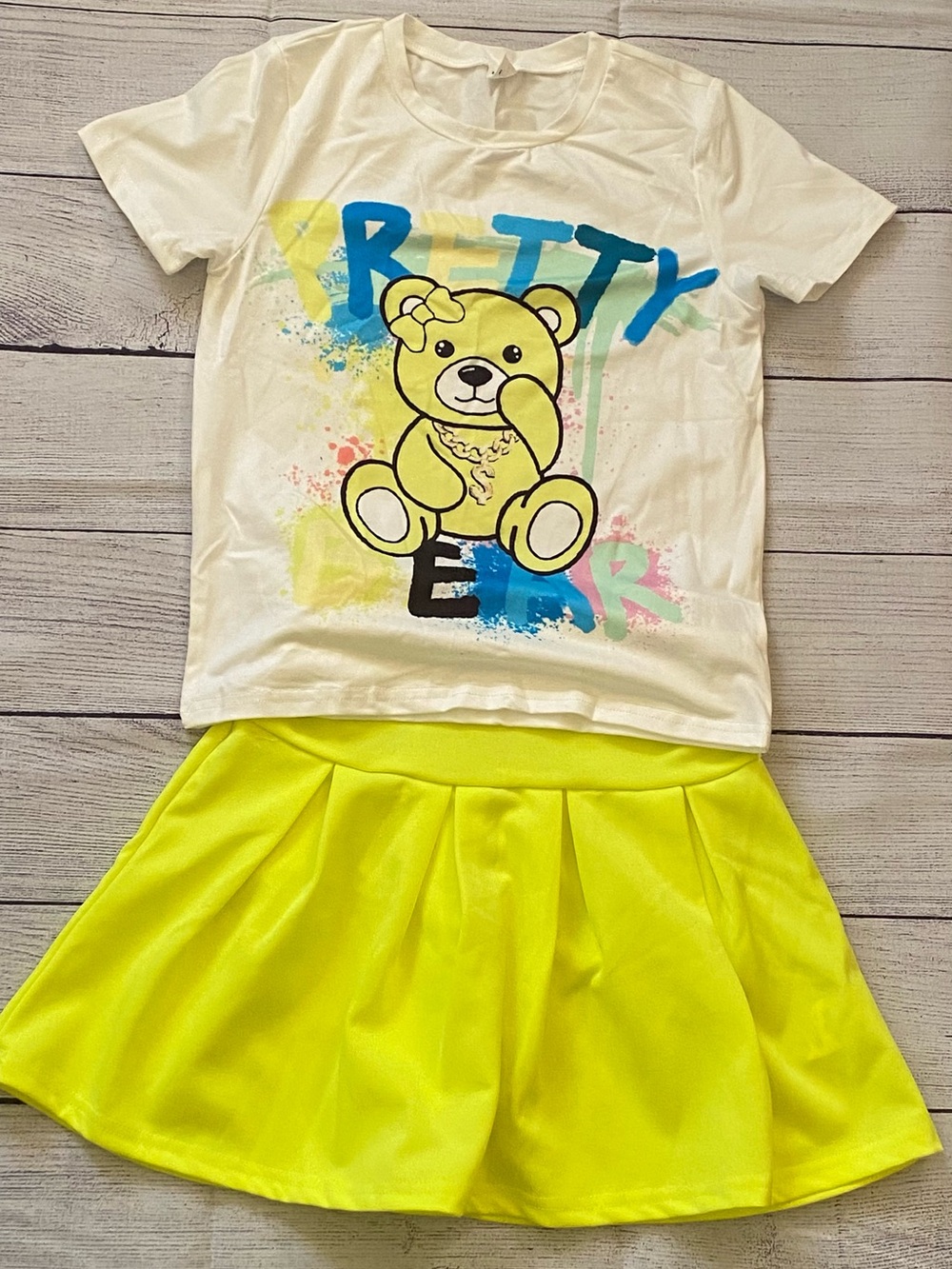 SHEIN White Tee with Yellow Bear Graphic & Neon Yellow Skirt